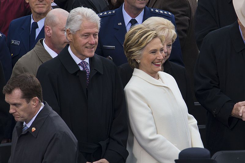 Bill and Hillary laughing public domain
